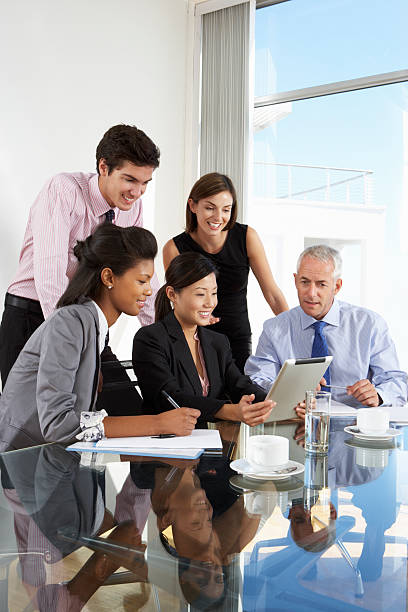 Business People Having Meeting Around